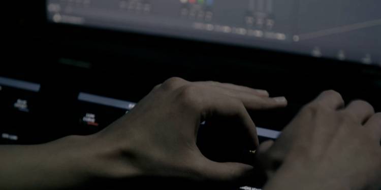 Close up of hands using editing software