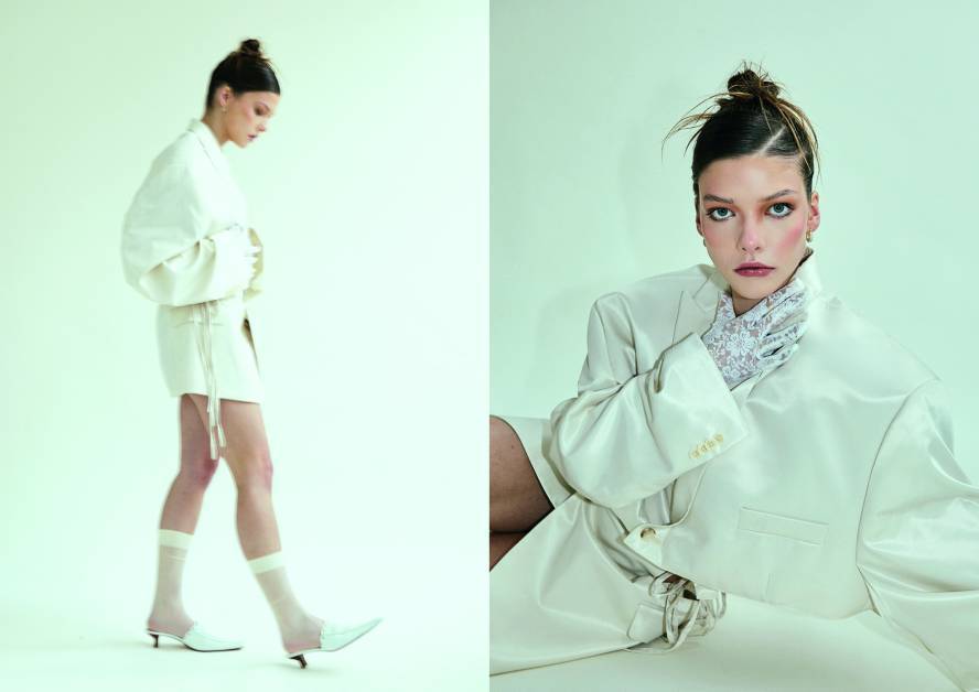 Model in lime green outfit poses against matching green background